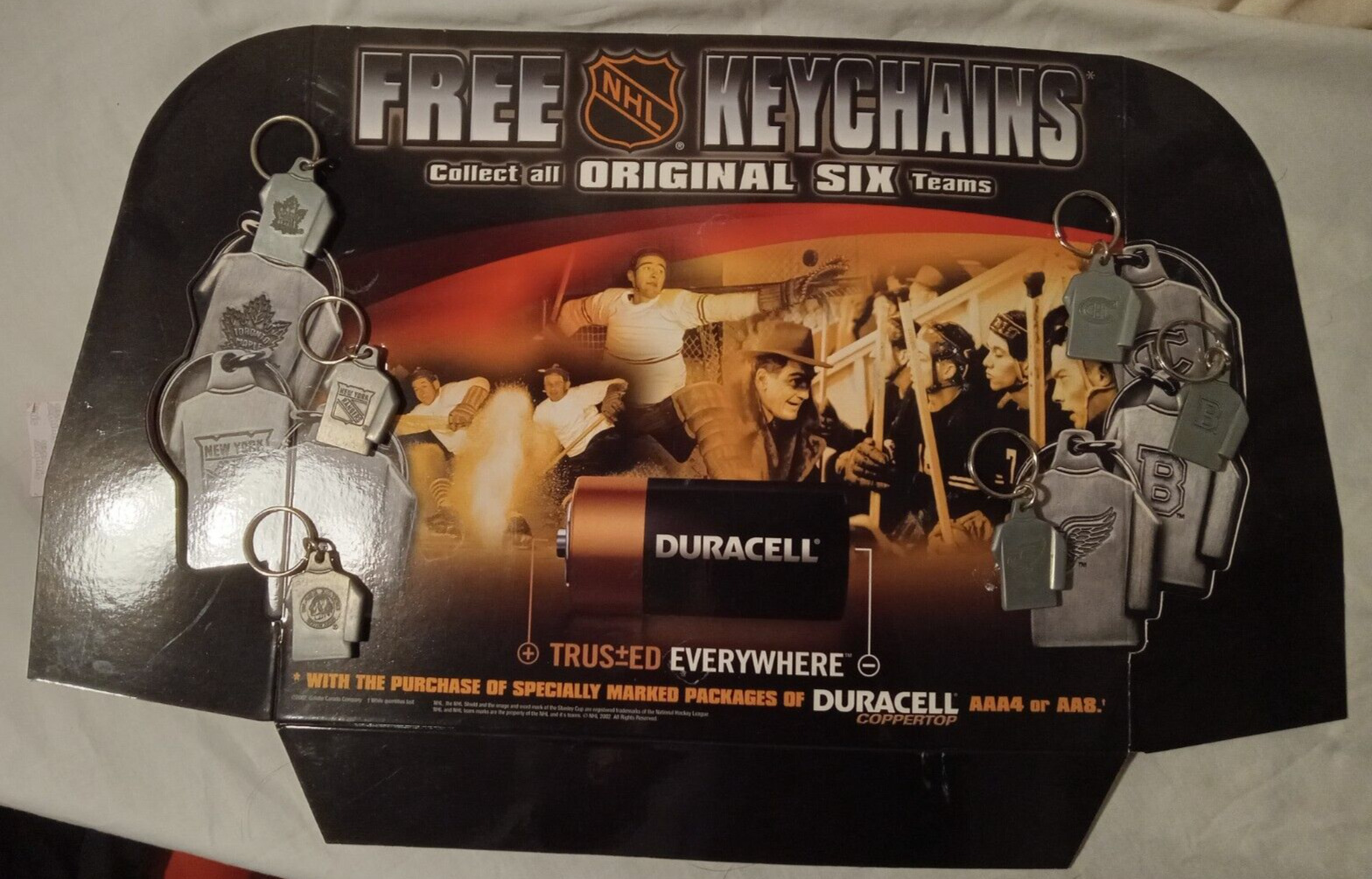 NHL Vintage Duracell Promo Key Rings Pewter Team Jerseys (6) on Original Ad