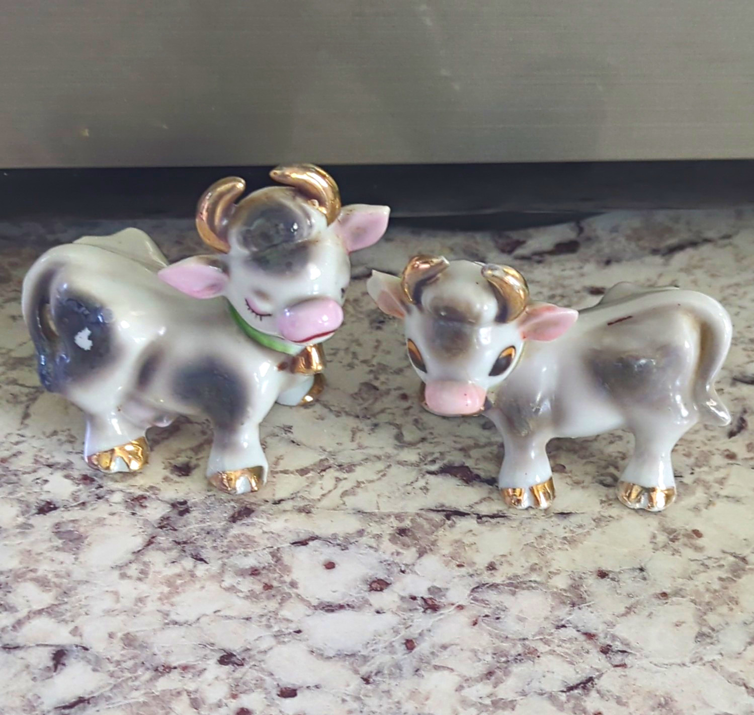 vintage mid-century ceramic cow and bull salt and pepper shakers made in Japan