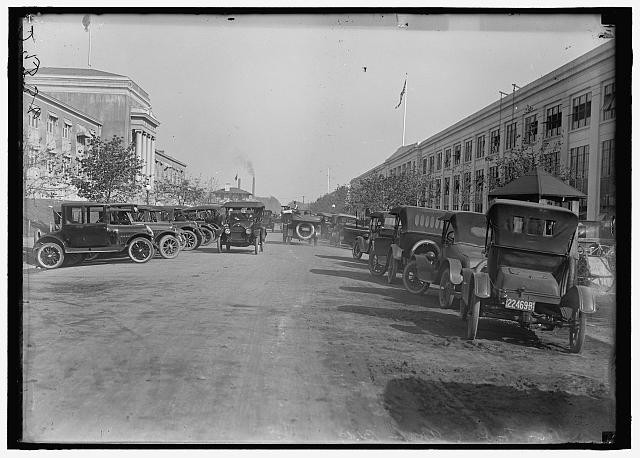 Photo:1917 1919 Vintage Automobiles Parked on City Street Outdoors