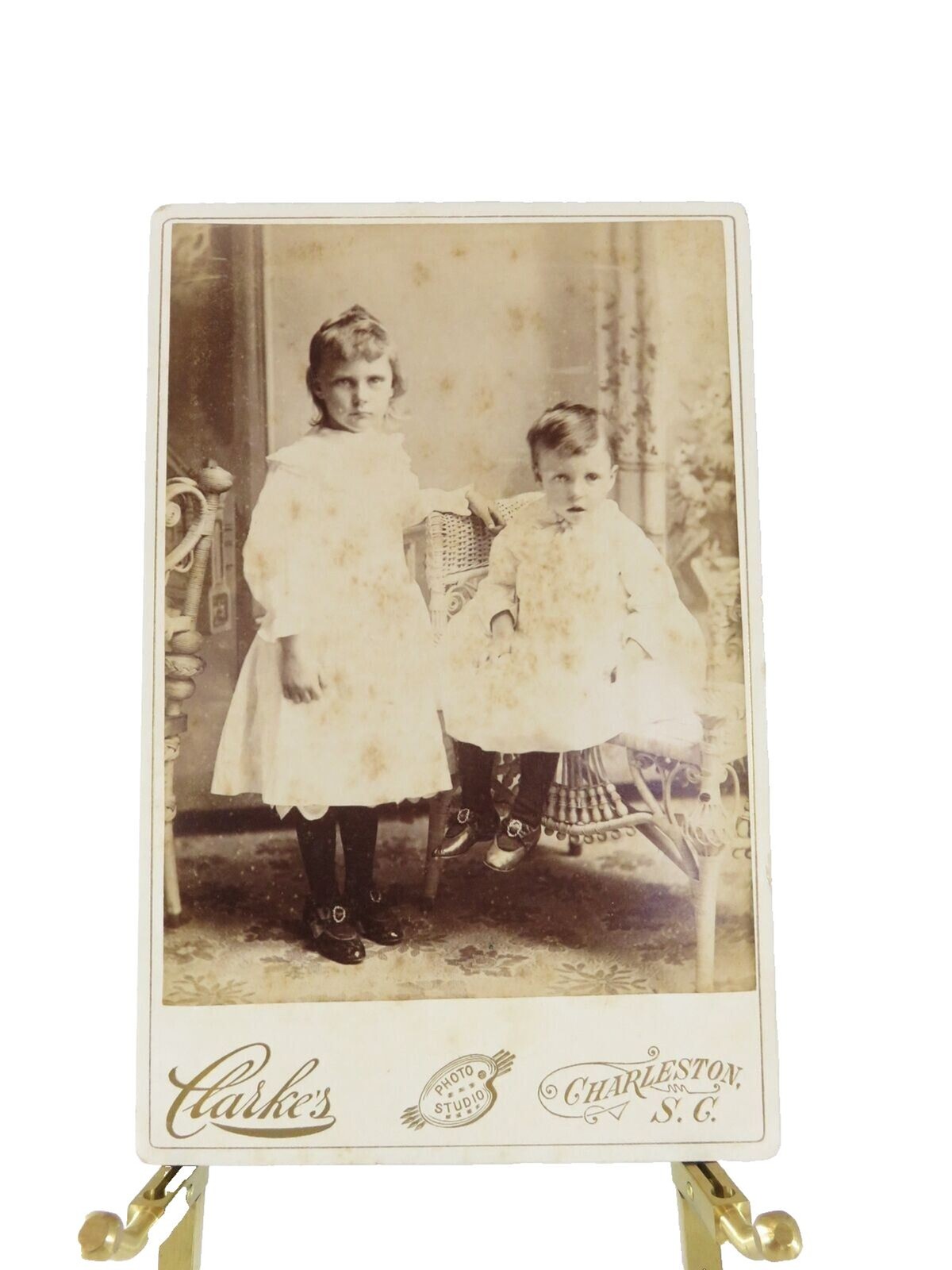 Two Children Wicker Furniture Clarke's Photo Studio, Charleston SC Cabinet Card Two Children Wicker Furniture Clarke's Photo Studio, Charleston SC Cabinet Card