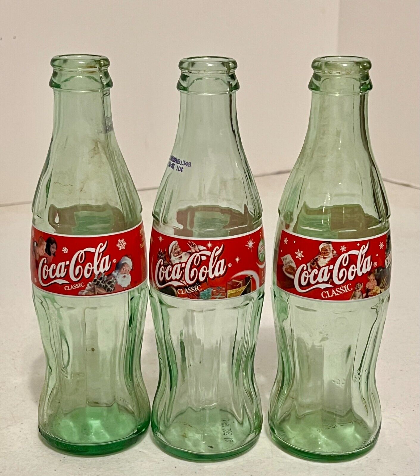Classic Coca-Cola Bottle 8 Oz Christmas 2000, 01 & 02 Edition Santa - EMPTY