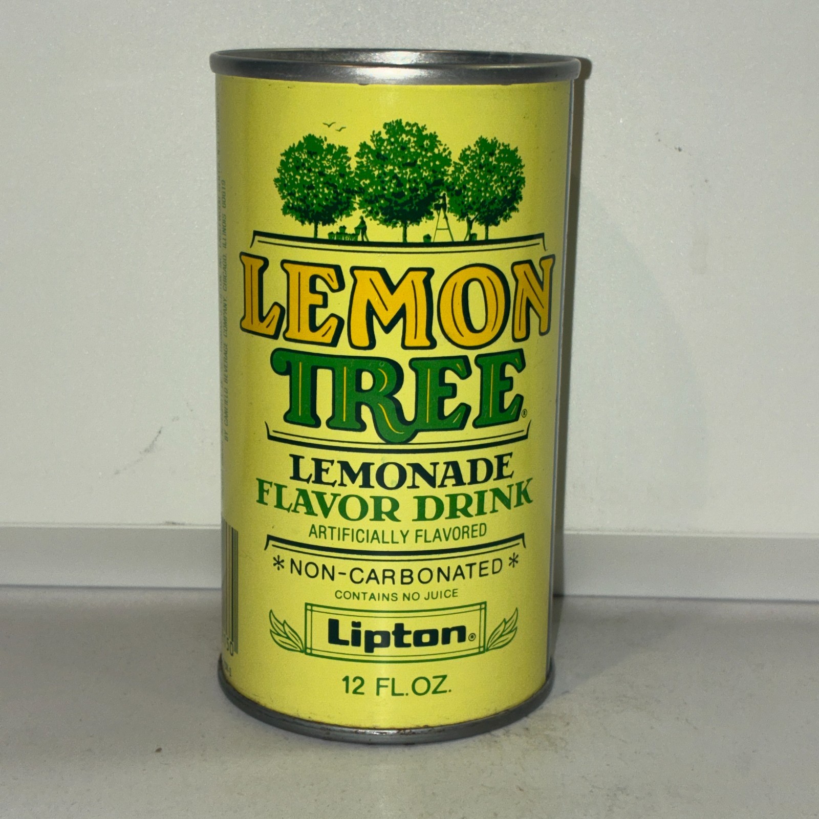 Lipton Lemon Tree Lemonade soda can, straight steel, bottom opened