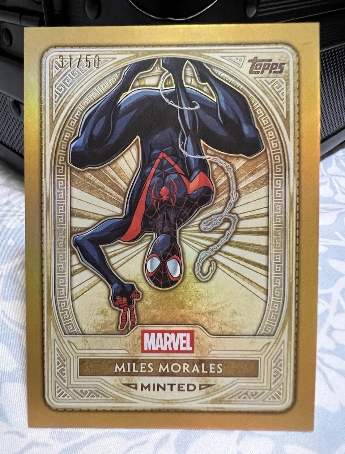 2025 Topps Marvel Mint— Miles Morales - GOLD /50 2025 Topps Marvel Mint— Miles Morales - GOLD /50