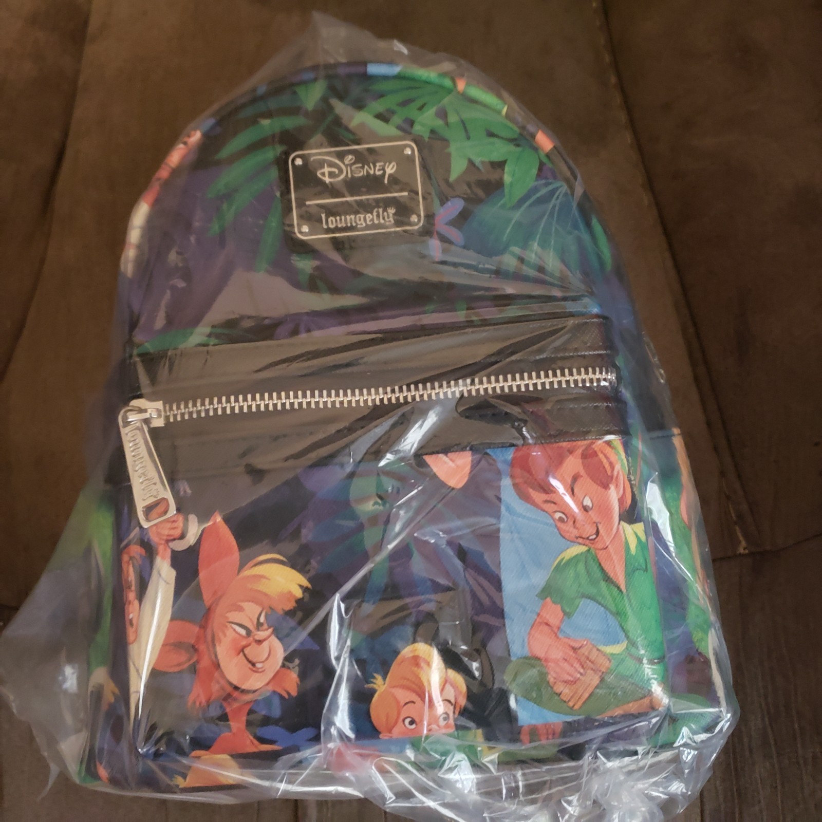 Loungefly Disney Peter Pan Scenes Mini Backpack Brand New With Tags. Loungefly Disney Peter Pan Scenes Mini Backpack Brand New With Tags.