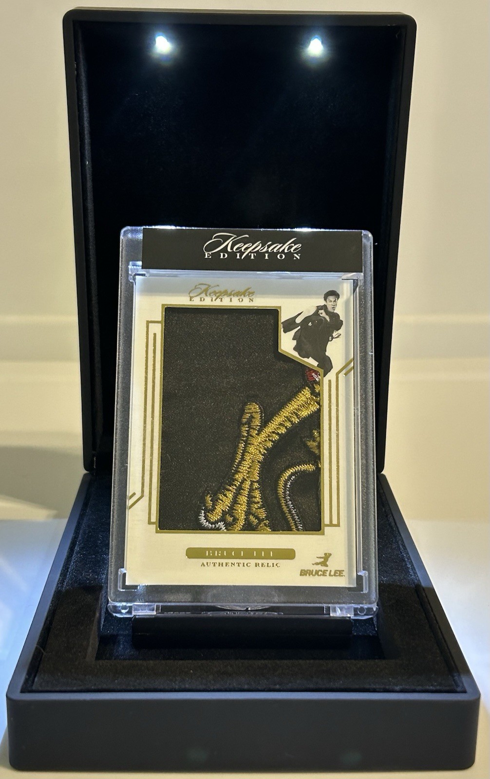 2024 Keepsake Bruce Lee 50th Anniversary #78 Authentic Relic #/50 with display 2024 Keepsake Bruce Lee 50th Anniversary #78 Authentic Relic #/50 with display