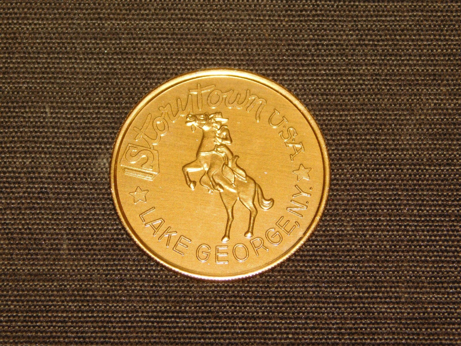 VINTAGE 1960-70S STORYTOWN GASLIGHT VILLAGE LAKE GEORGE NY SOUVENIR METAL COIN VINTAGE 1960-70S STORYTOWN GASLIGHT VILLAGE LAKE GEORGE NY SOUVENIR METAL COIN