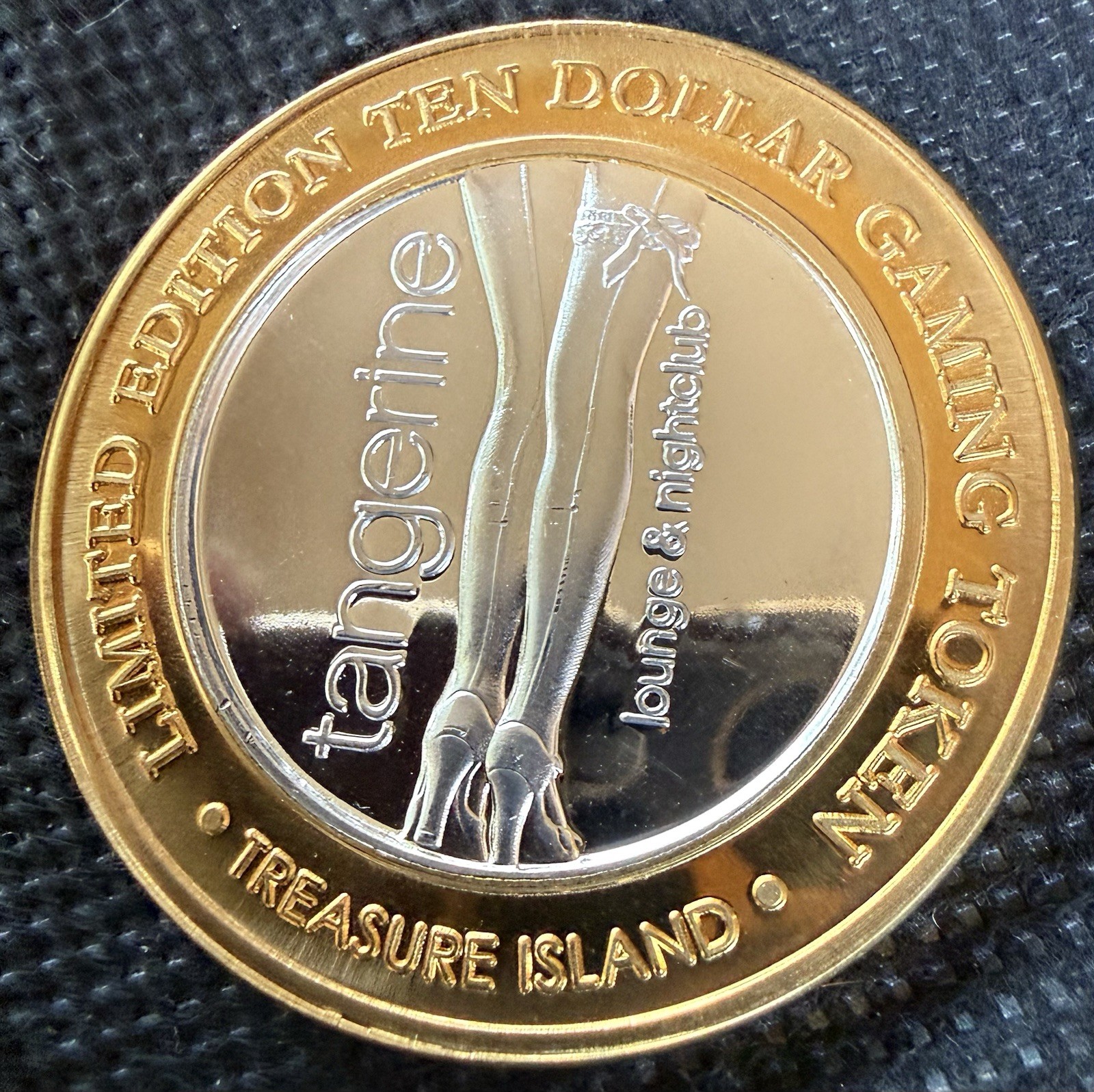 TREASURE ISLAND HOTEL & CASINO Limited Edition 99.99% .6 Oz. Pure Silver Center TREASURE ISLAND HOTEL & CASINO Limited Edition 99.99% .6 Oz. Pure Silver Center