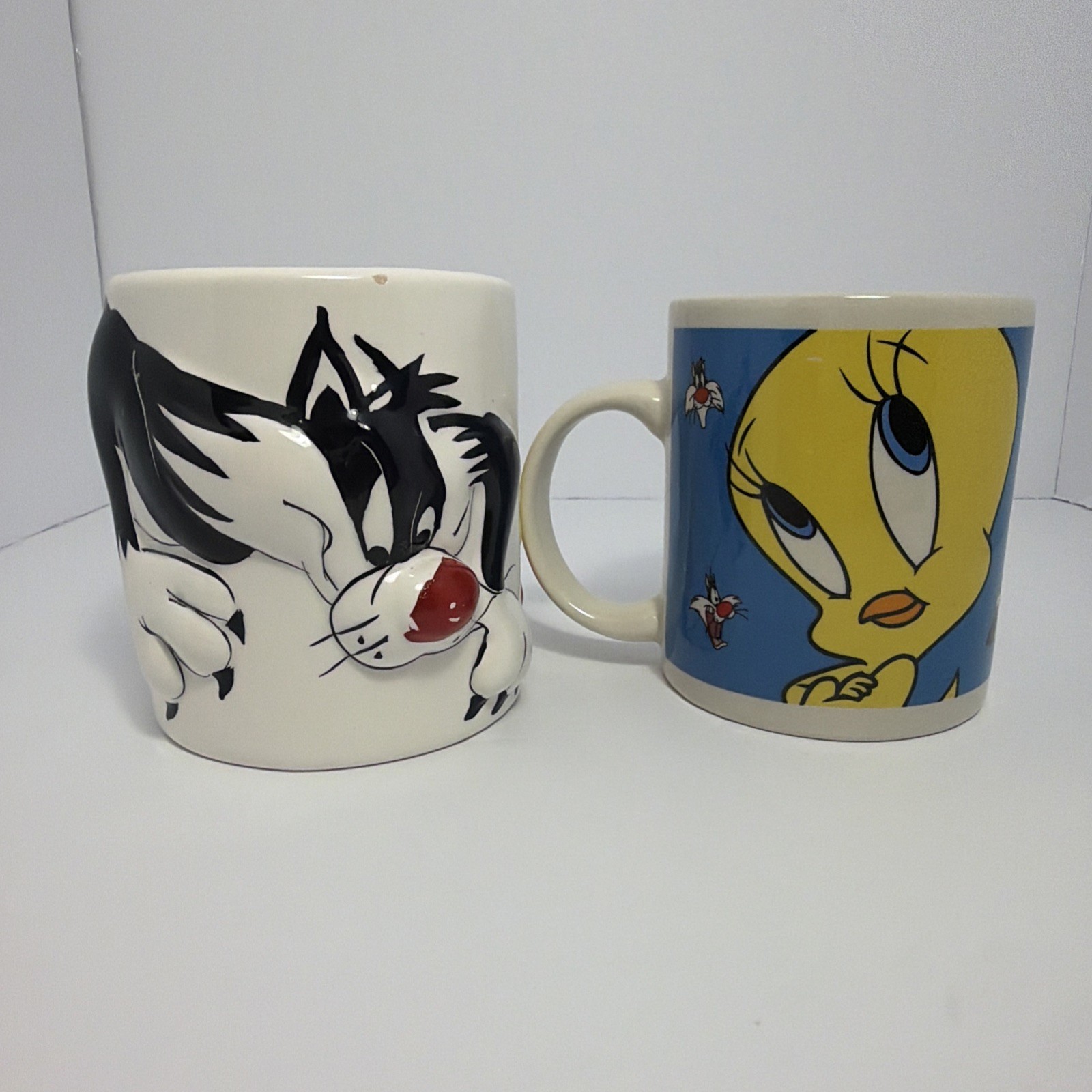Lot Of 2 Vintage 1999 Gibson Housewares Sylvester And Tweety Bird Coffee Cups Lot Of 2 Vintage 1999 Gibson Housewares Sylvester And Tweety Bird Coffee Cups
