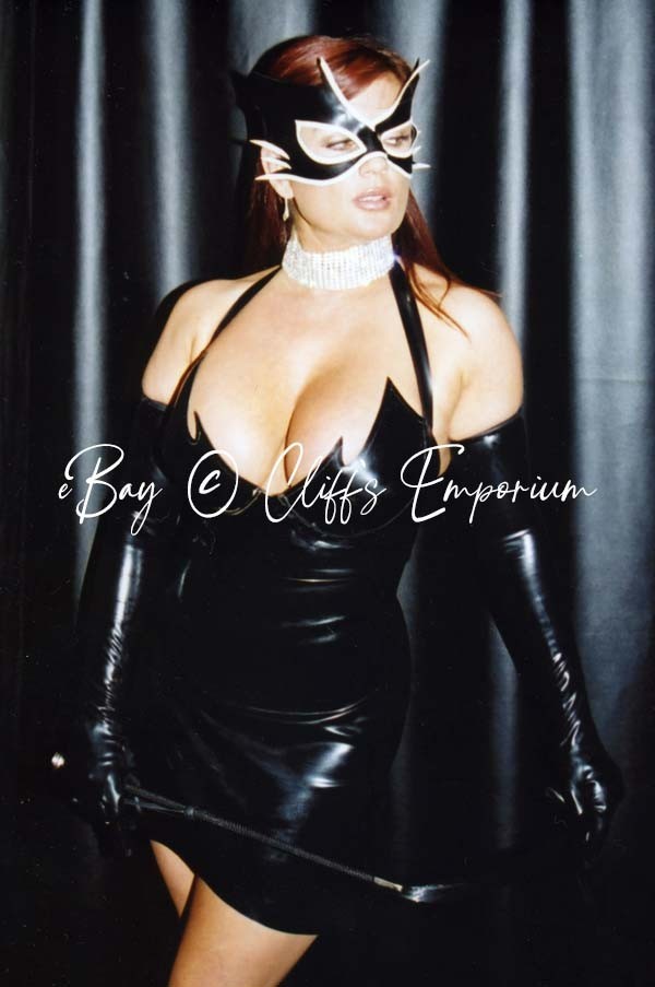 Professionally Taken Photo of a Strict Woman Teresa May in A PVC Dress image_458