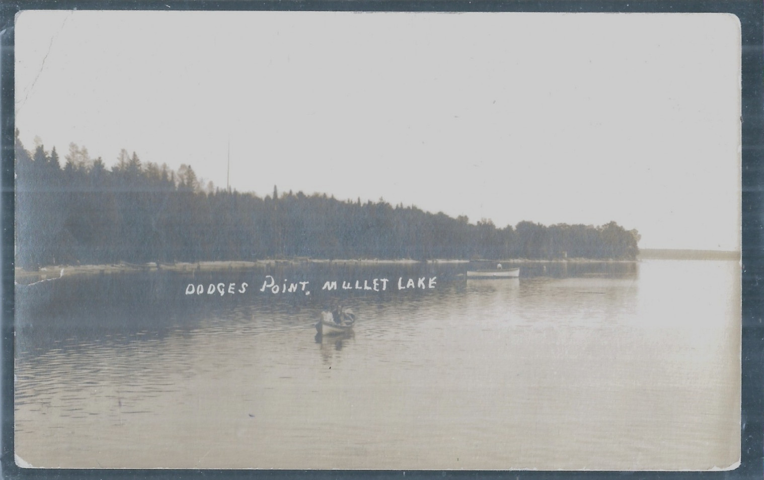 NICE EARLY RPPC VIEW OF BOATS AT DODGES POINT ON MULLET LAKE, MI 1910