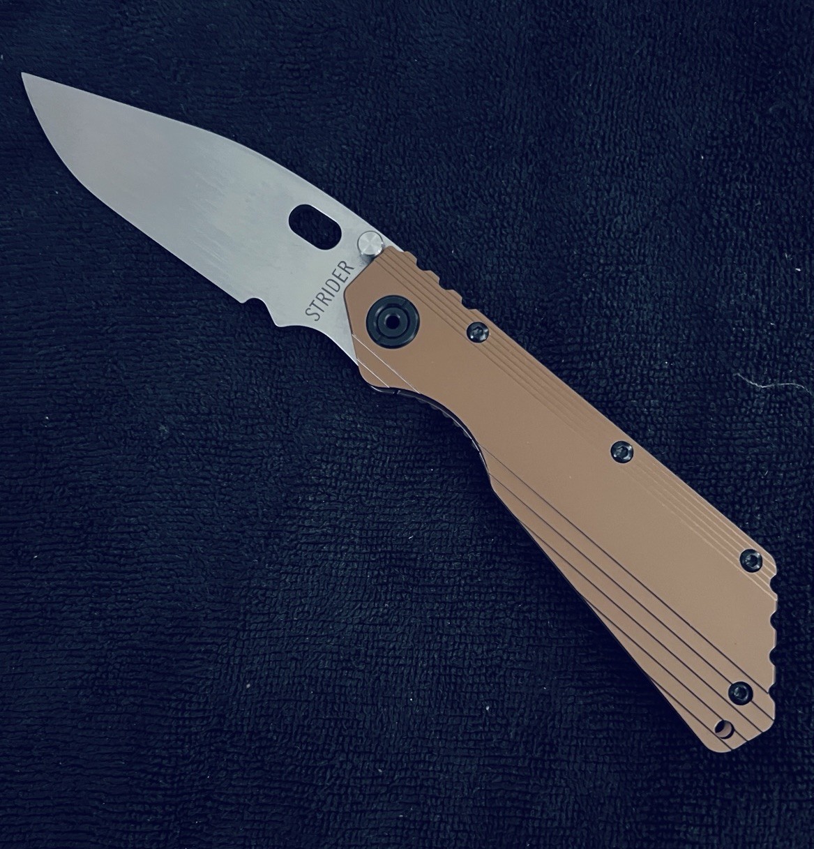 Massively Overbuilt Bronzed Titanium Frame Lock Folder w/ 4” Chisel Grind Blade