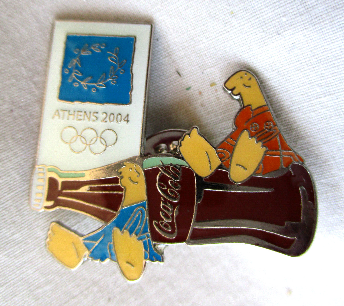 Athens Greece Olympic 2004 Coca Cola Mascot Lapel Pin Souvenir Coke Bottle