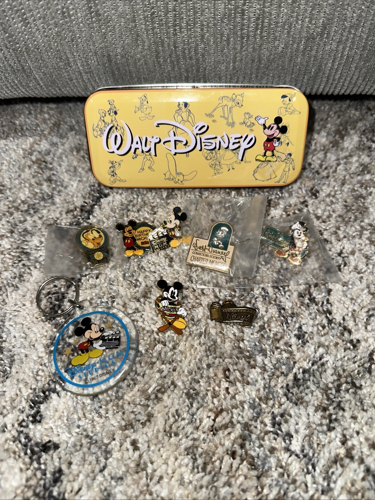 Lot Of 7 Disney Pins 1 Keychain And 1 Small Store Tin Lot Of 7 Disney Pins 1 Keychain And 1 Small Store Tin