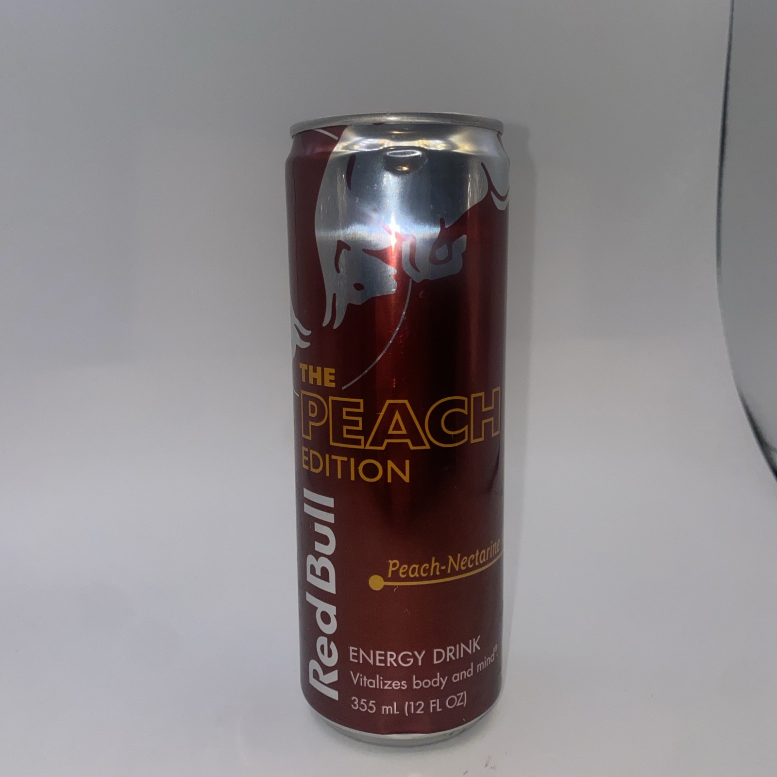 Unopened EMPTY Can of Peach Edition Peach-Nectarine Red Bull Unopened EMPTY Can of Peach Edition Peach-Nectarine Red Bull