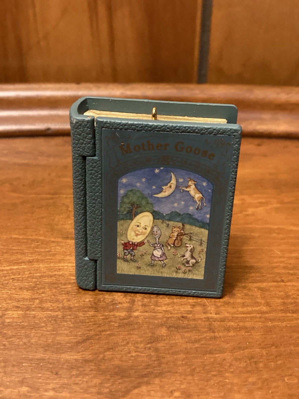 Hallmark 1994 Mother Goose Cow Jumped Over Moon Book Christmas Ornament Hallmark 1994 Mother Goose Cow Jumped Over Moon Book Christmas Ornament