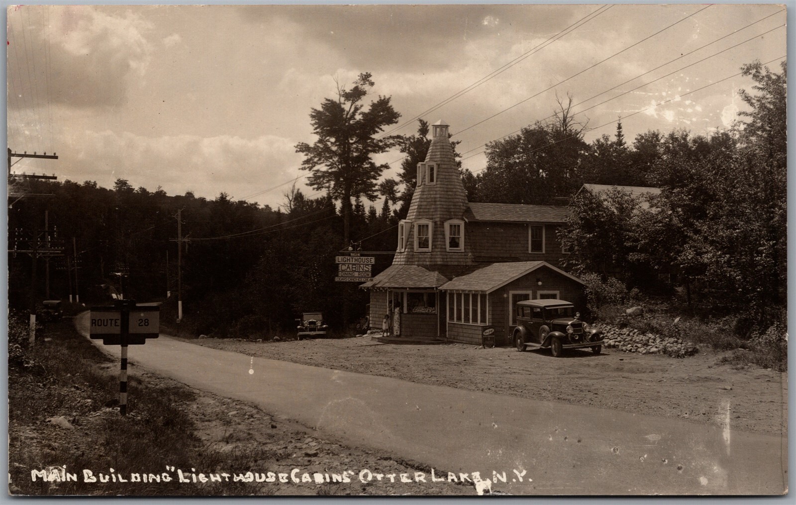 Postcard RPPC Otter Lake New York Main Building Lighthouse Cabins Old Cars Postcard RPPC Otter Lake New York Main Building Lighthouse Cabins Old Cars