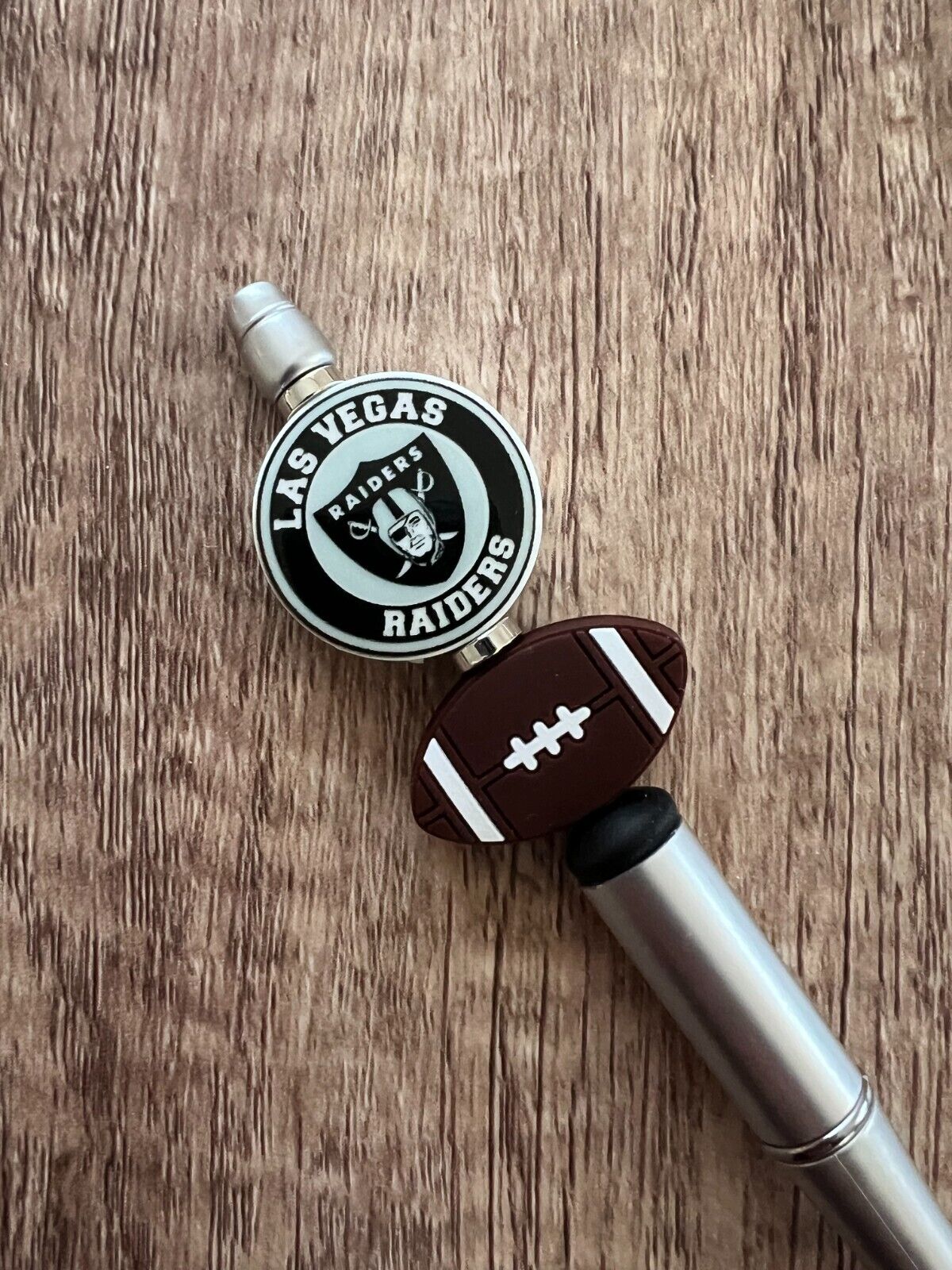 Football Pen. Raiders, Cowboys, Patriots, Dolphins, Titans, and Giants