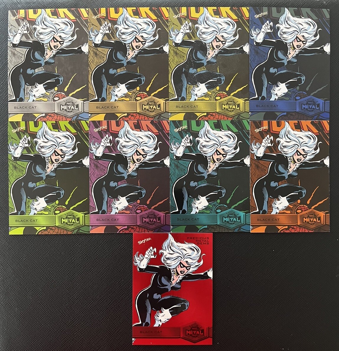 2022 Upper Deck Marvel Metal Black Cat Rainbow PMG Orange Turquoise Pink Neon 2022 Upper Deck Marvel Metal Black Cat Rainbow PMG Orange Turquoise Pink Neon