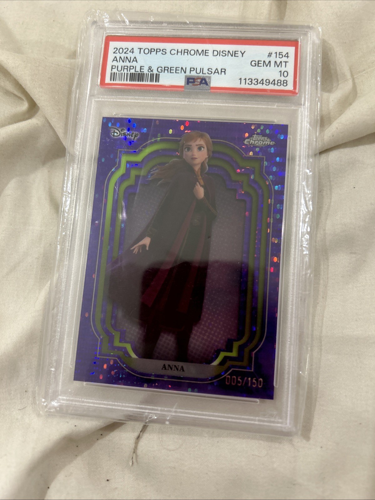 Anna - 2024 Topps Chrome Disney #154 Purple & Green Pulsar Refractor /150. PSA10