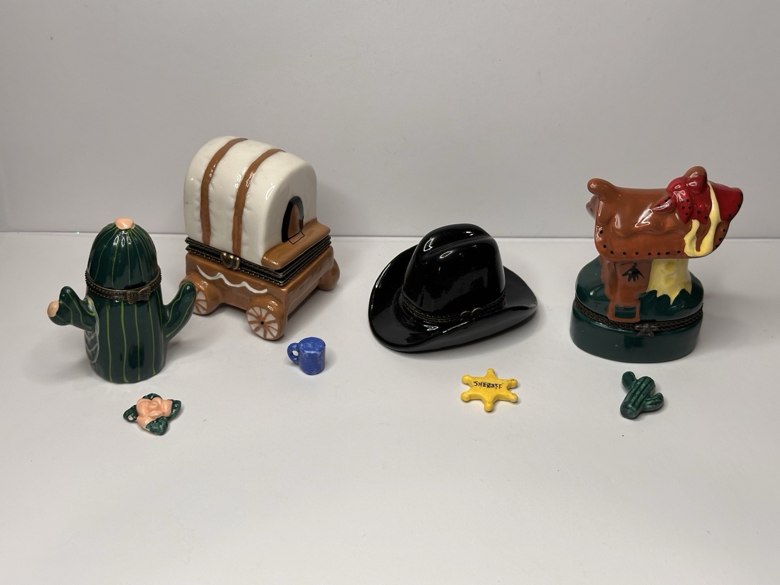 Set of 4 Western Porcelain Hinged Trinket Boxes Saddle Cactus Hat Carriage Set of 4 Western Porcelain Hinged Trinket Boxes Saddle Cactus Hat Carriage