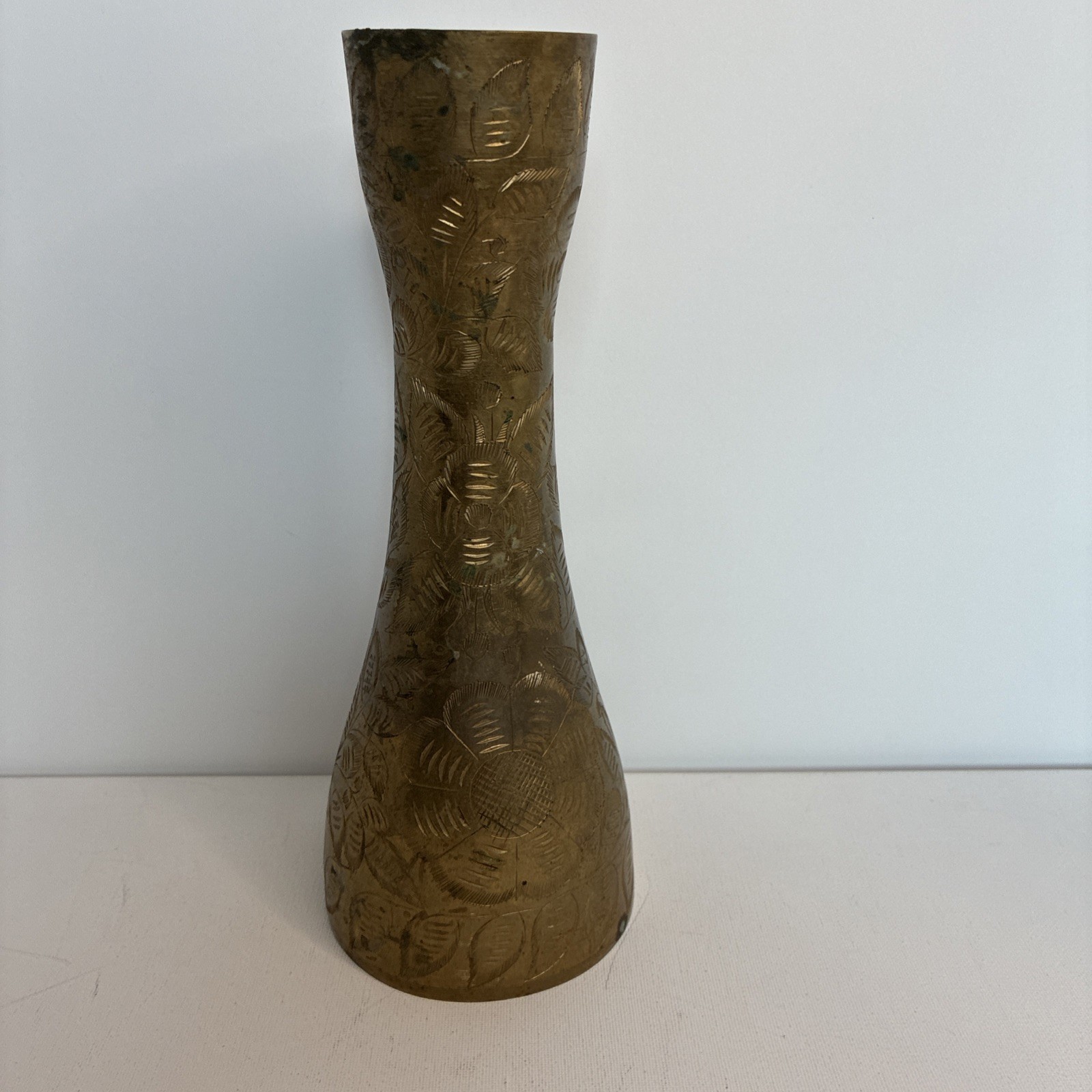 Vintage hand-etched Sarana brass vase from India, floral motifs, hourglass body Vintage hand-etched Sarana brass vase from India, floral motifs, hourglass body