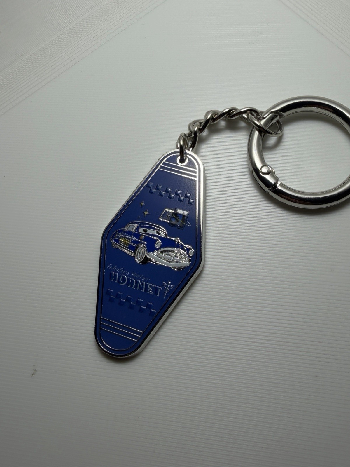 BoxLunch Disney Pixar Cars Blind Box Motel Keychain - Doc Hudson BoxLunch Disney Pixar Cars Blind Box Motel Keychain - Doc Hudson