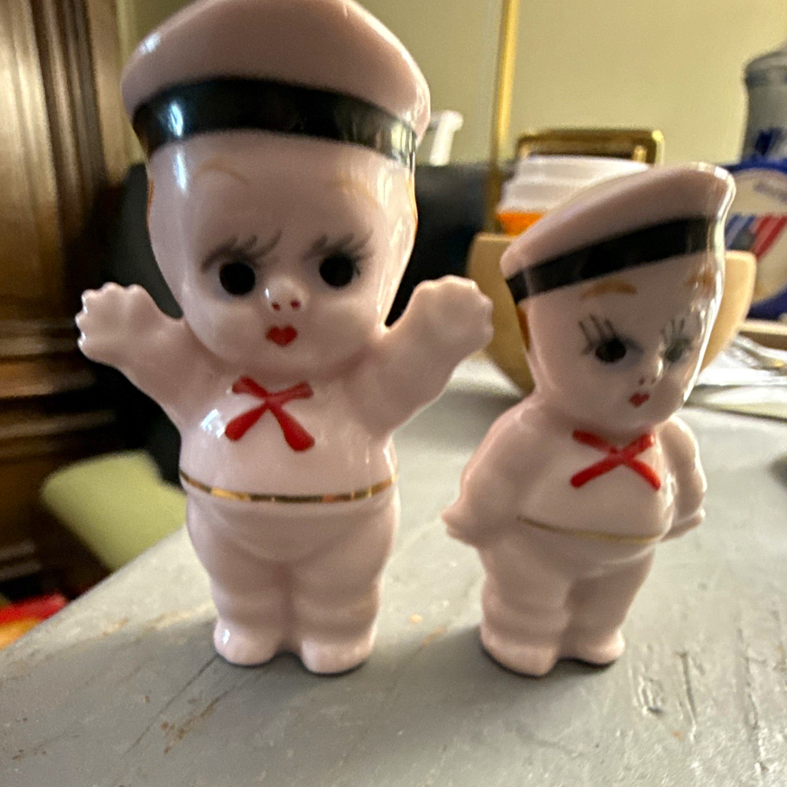 Porcelain kewpie sailor boys from Japan all in pink with gold red and black deco