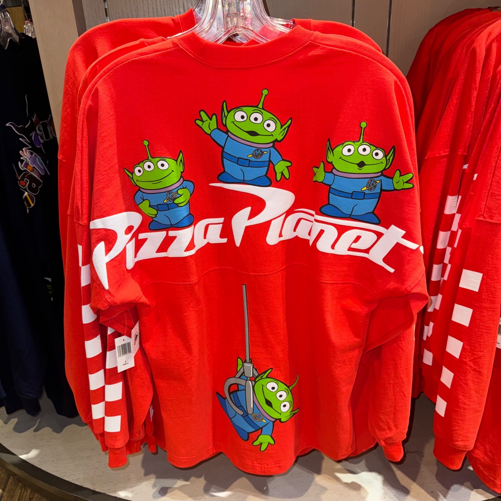 2026 Disney Parks Toy Story Pizza Planet Aliens Red Spirit Jersey Adult Szs NWT 2026 Disney Parks Toy Story Pizza Planet Aliens Red Spirit Jersey Adult Szs NWT