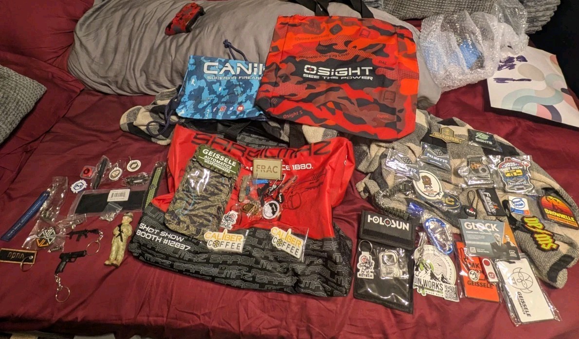 Huge Lot of Various Shotshow Items From Gun Show Pins Patches More
