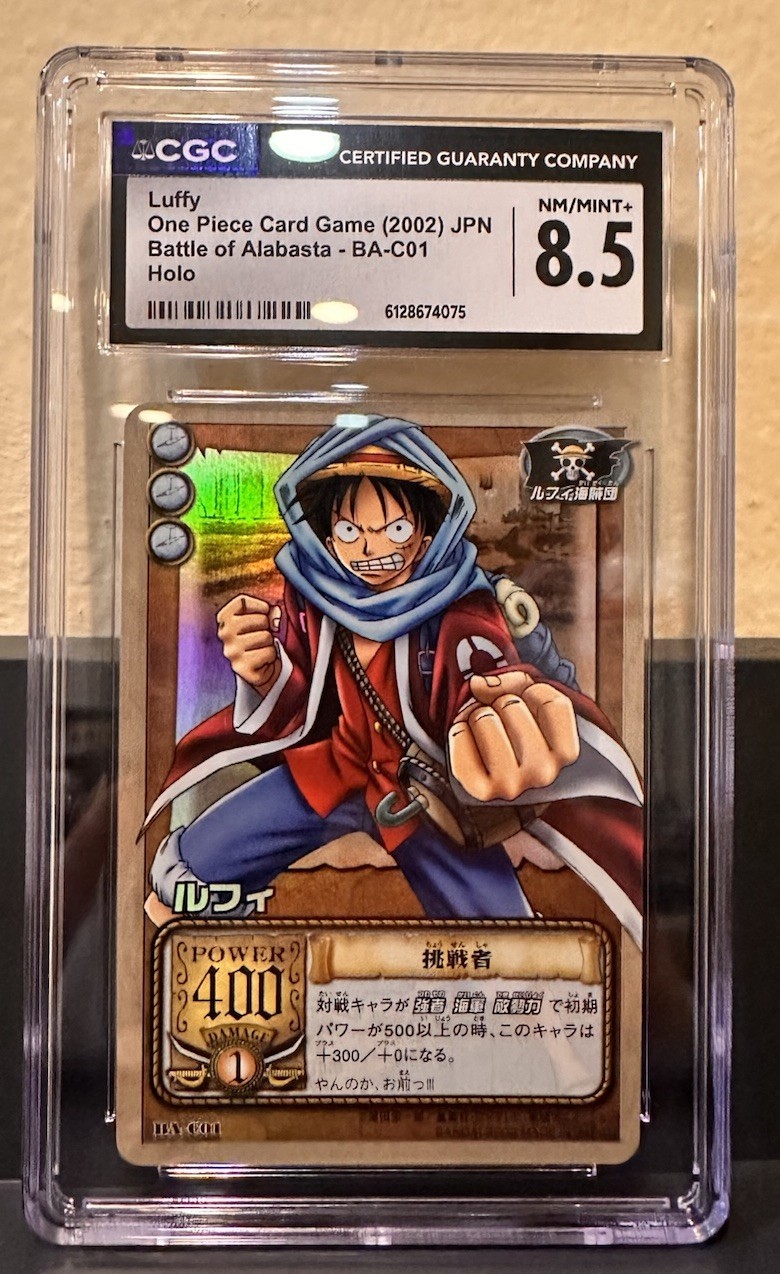 2002 ONE PIECE CARD GAME JPN BATTLE OF ALABASTA - HOLO #BA-C01 LUFFY CGC 8.5 2002 ONE PIECE CARD GAME JPN BATTLE OF ALABASTA - HOLO #BA-C01 LUFFY CGC 8.5