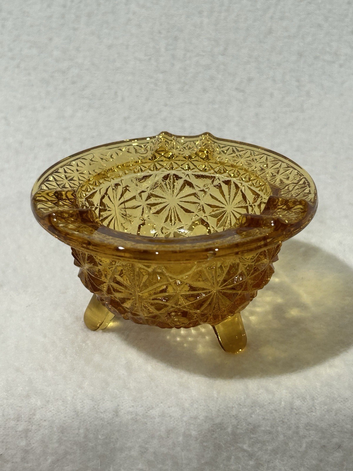 Vintage Amber Pressed Glass Ashtray Three Footed Mid-Century Vintage Amber Pressed Glass Ashtray Three Footed Mid-Century