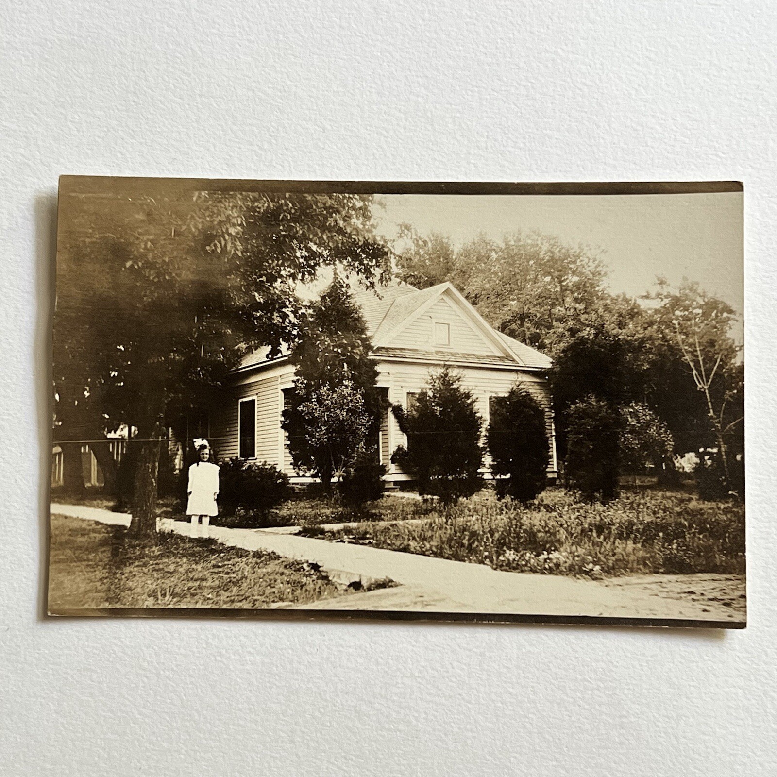 Antique RPPC Real Photograph Postcard Adorable Girl Sidewalk In Front Of House Antique RPPC Real Photograph Postcard Adorable Girl Sidewalk In Front Of House