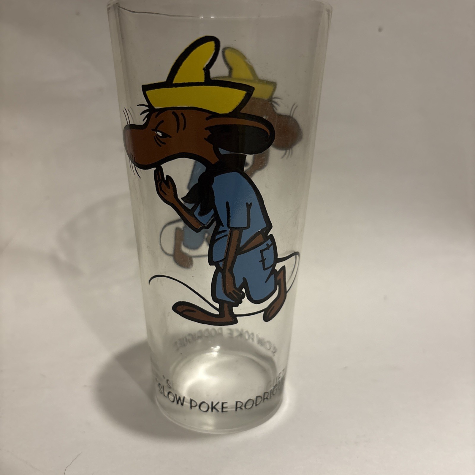 1973 Warner Bros. Inc Looney Tunes Pepsi Glass - Slow Poke Rodriguez Black 1973 Warner Bros. Inc Looney Tunes Pepsi Glass - Slow Poke Rodriguez Black