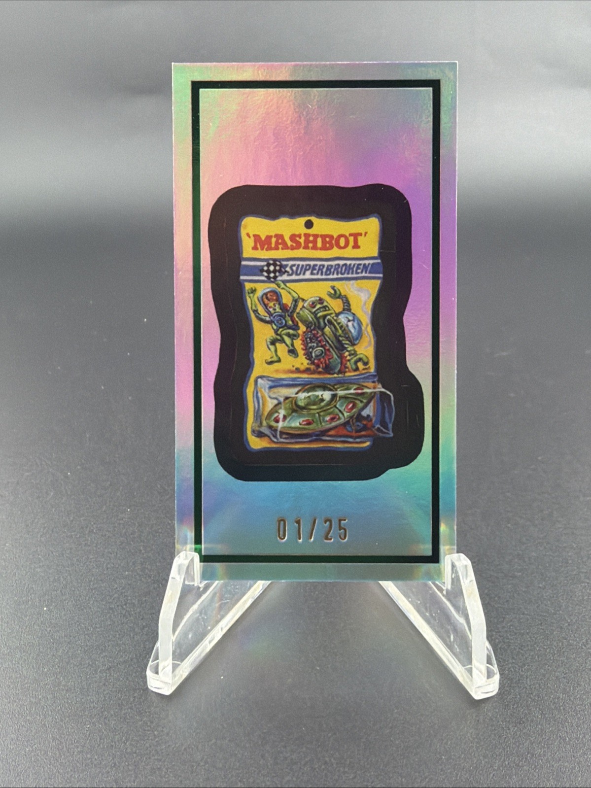 2026 Topps Mars Attacks Xmas Mashbot Superbroken Rainbow Foil Topper 1/25 SSP 2026 Topps Mars Attacks Xmas Mashbot Superbroken Rainbow Foil Topper 1/25 SSP