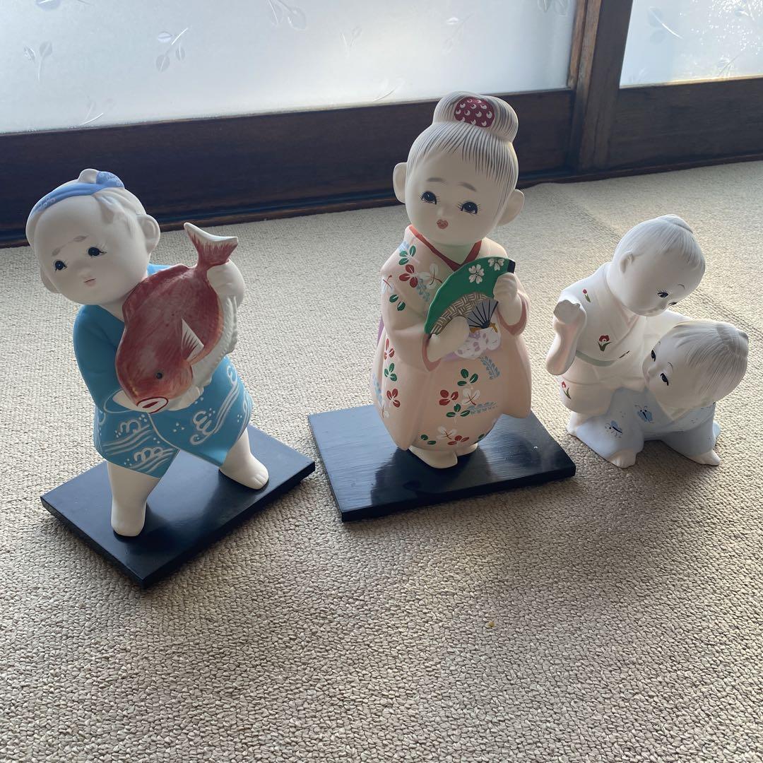A Set Of 1 Rakuzan Hakata Doll And 2 Other Dolls.