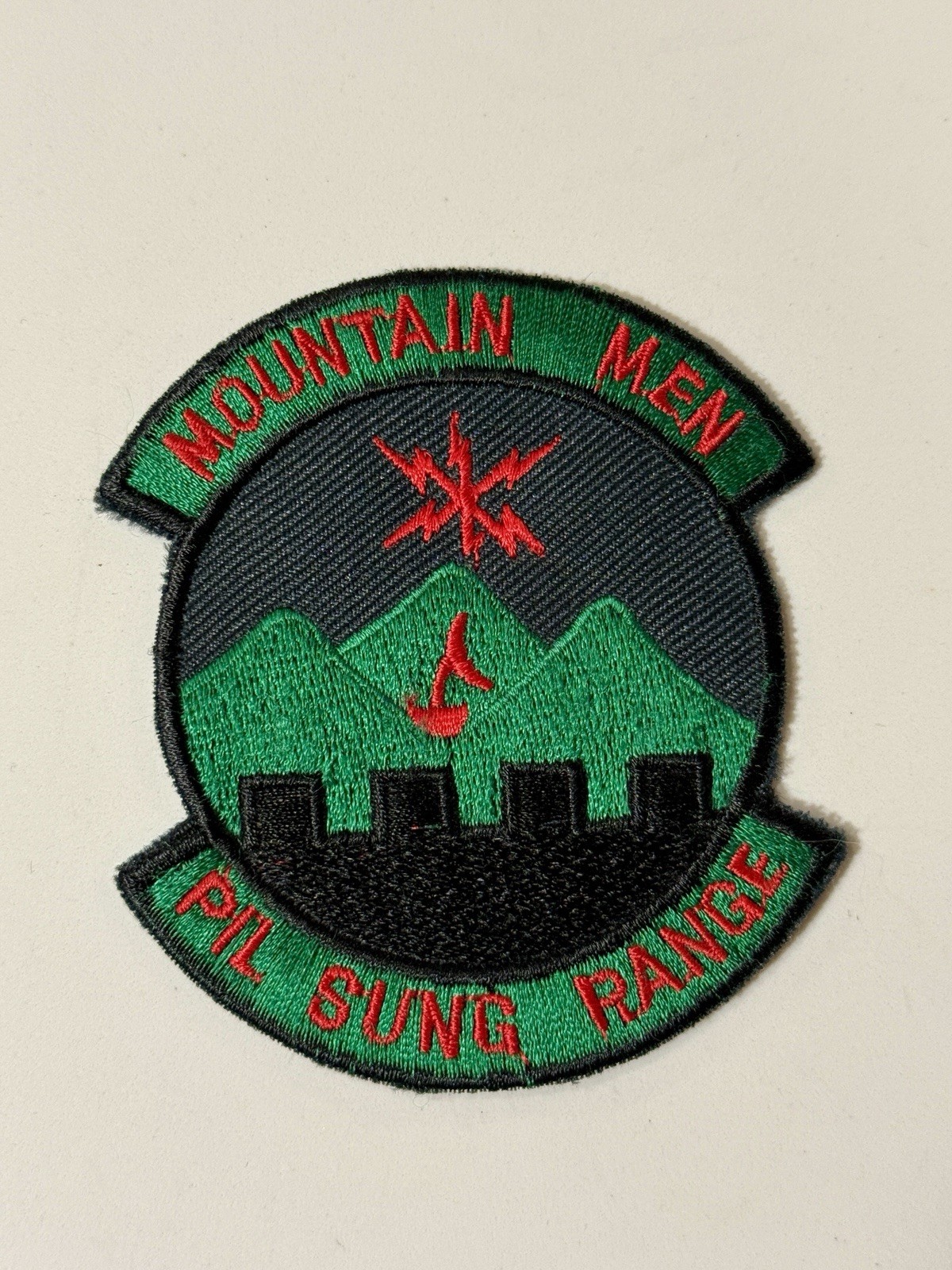 VERY RARE USAF 6351st TEWTS - Pil Sung Range South Korea “Mountain Men” Patch VERY RARE USAF 6351st TEWTS - Pil Sung Range South Korea “Mountain Men” Patch