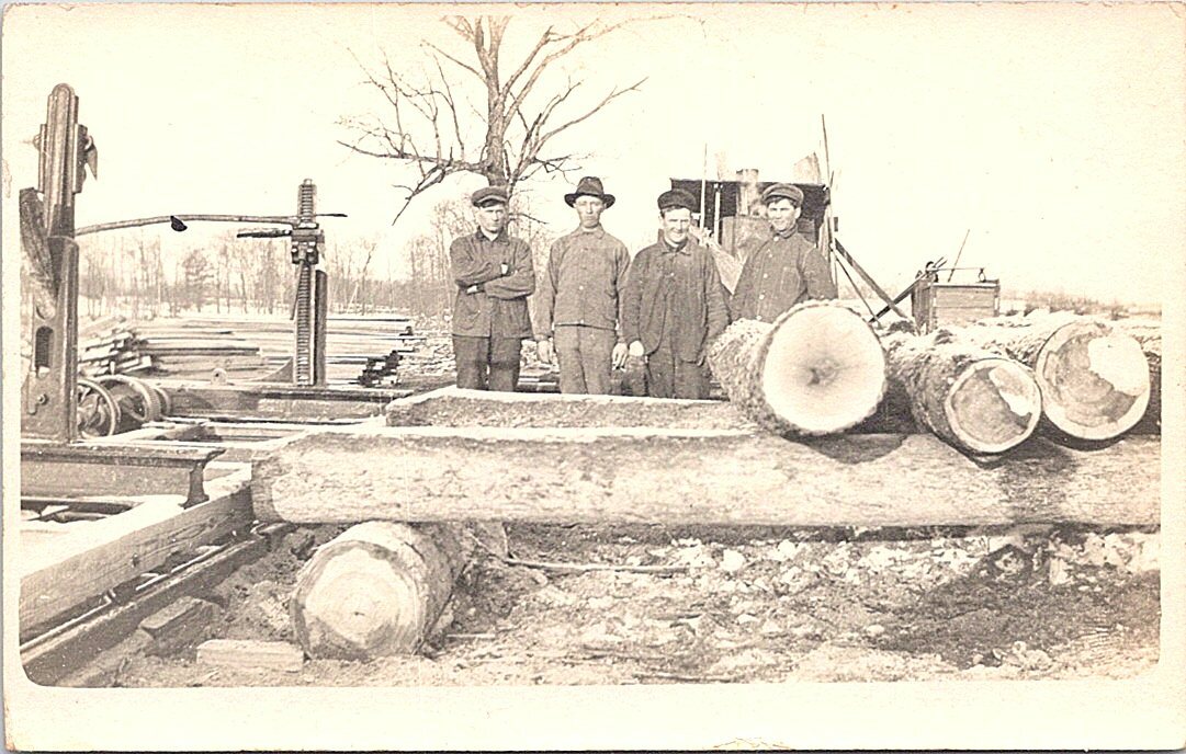 RPPC Logging Scene Lumberjacks Cutting Logs w/ Makeshift Sawmill early 1900s RPPC Logging Scene Lumberjacks Cutting Logs w/ Makeshift Sawmill early 1900s