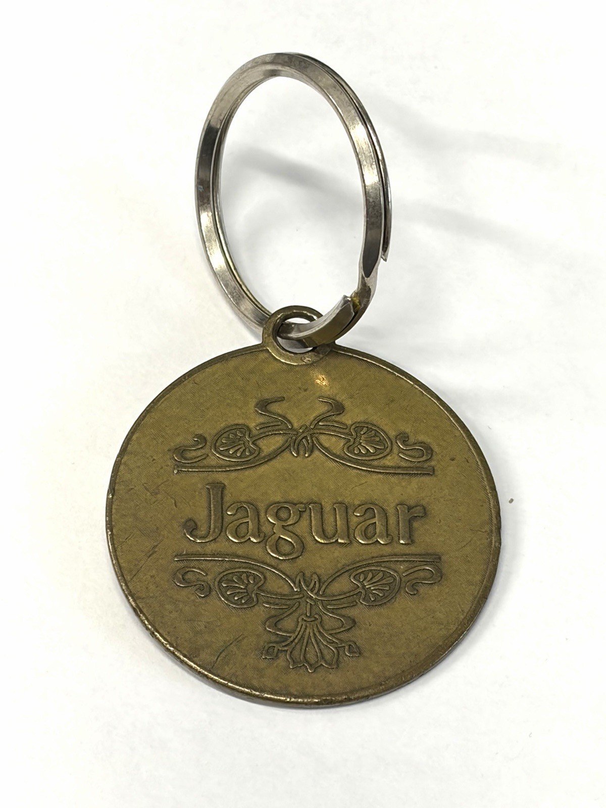 Vintage Jaguar 1978 Stamped Lowell Sigmund Keychain Fob Vintage Jaguar 1978 Stamped Lowell Sigmund Keychain Fob