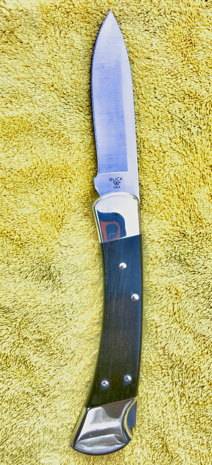 New Buck 110 Drop Point, Nickel Silver Bolsters, Ebony Scales New Buck 110 Drop Point, Nickel Silver Bolsters, Ebony Scales