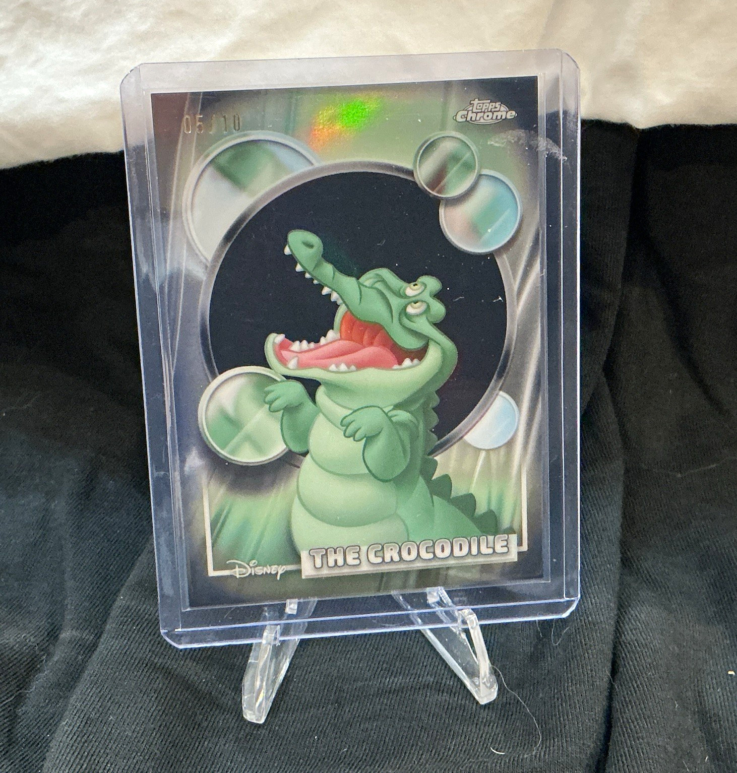2026 Topps Chrome Disney The Crocodile /10 - Black Shimmer #167 2026 Topps Chrome Disney The Crocodile /10 - Black Shimmer #167