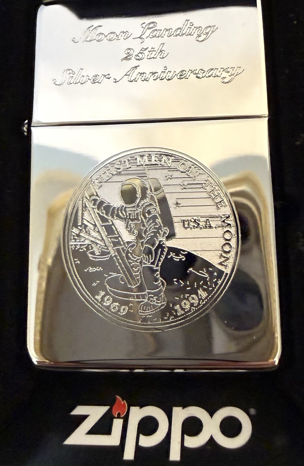 Zippo 1994 25th Anniversary Men on the Moon Unfired Orange Seal Intact Mint wBox Zippo 1994 25th Anniversary Men on the Moon Unfired Orange Seal Intact Mint wBox