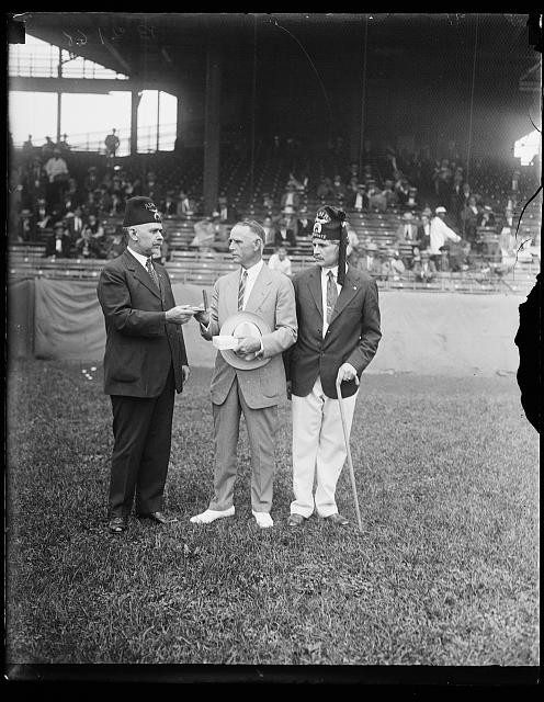 Photo:Shriners 1910s men in fez hats at ballpark stadium field