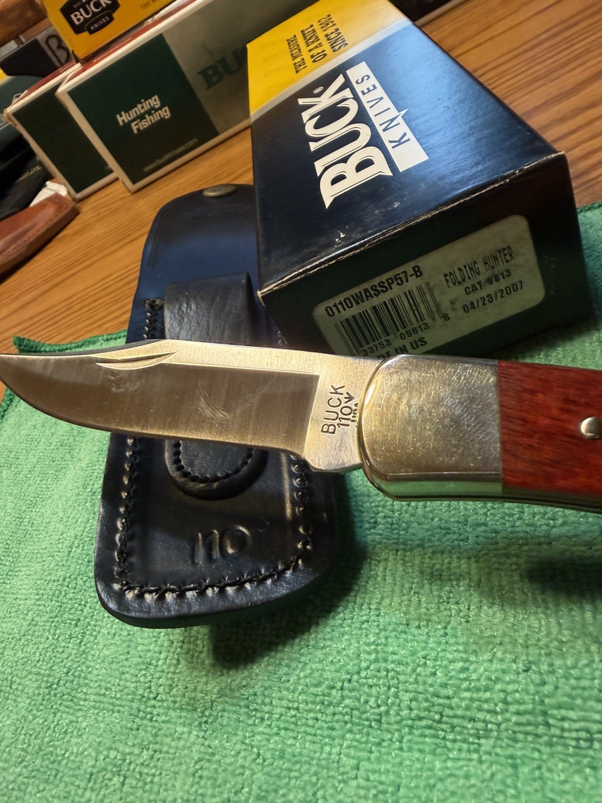 2007 Cherrywood Buck 110 Nickel Bolsters Cherrywood Handle in Box. 2007 Cherrywood Buck 110 Nickel Bolsters Cherrywood Handle in Box.