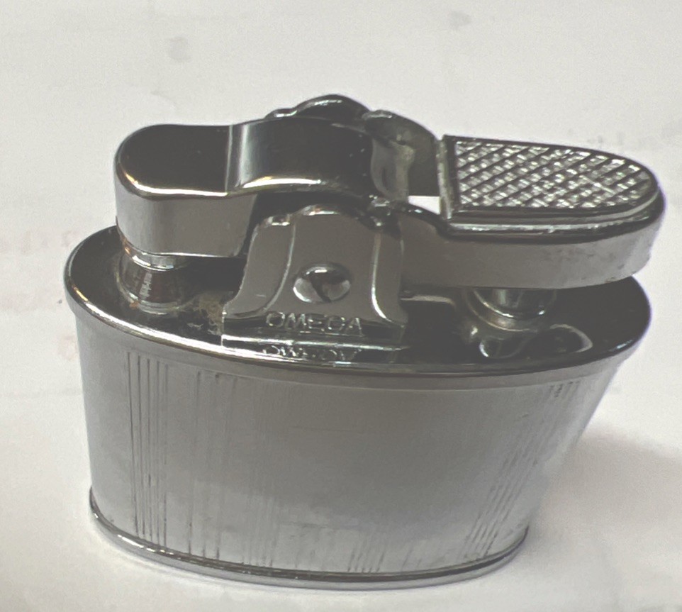 Vintage Omega Pocket Lighter, silver with accented etched lines-- Very Nice Vintage Omega Pocket Lighter, silver with accented etched lines-- Very Nice