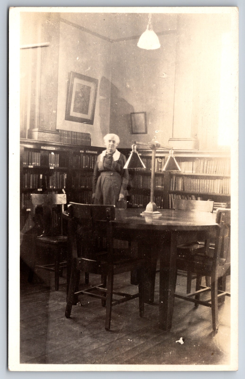 Interior Librarian at Bookshelves at the Library c1920 Real Photo RPPC Interior Librarian at Bookshelves at the Library c1920 Real Photo RPPC