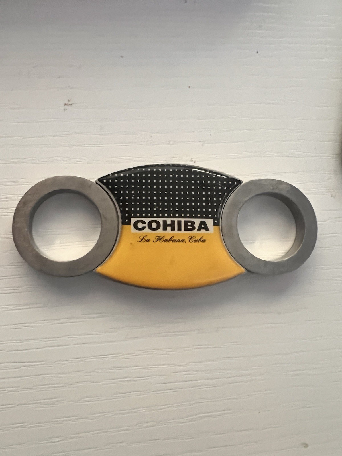 Cohiba Cigar Cutter Vintage And Heavy Metal. Yellow And Black Colorful Label Cohiba Cigar Cutter Vintage And Heavy Metal. Yellow And Black Colorful Label