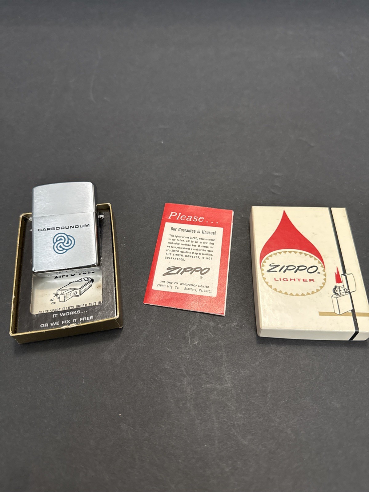 VINTAGE 1968 Zippo Lighter Never Fired rare CARBORUNDUM VINTAGE 1968 Zippo Lighter Never Fired rare CARBORUNDUM