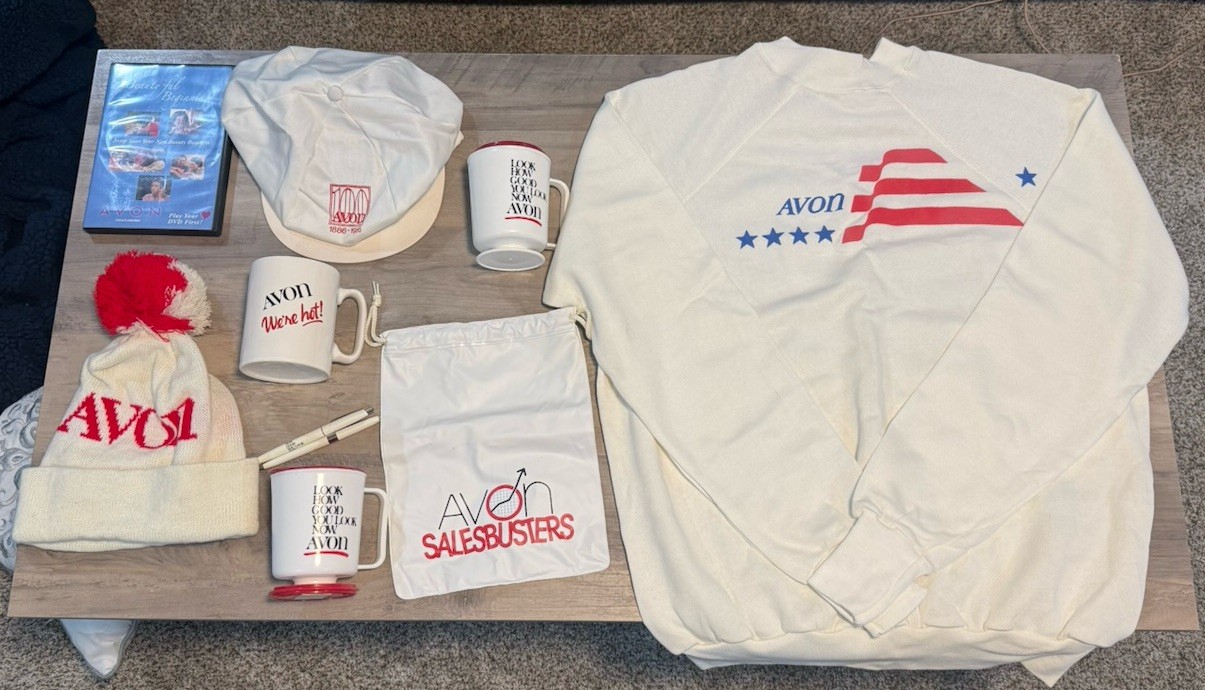 VTG Avon Memorabilia Lot. Crewneck Shirt, 2 Hats, 3 Cups, 2 Pens, Cinch Bag, DVD VTG Avon Memorabilia Lot. Crewneck Shirt, 2 Hats, 3 Cups, 2 Pens, Cinch Bag, DVD