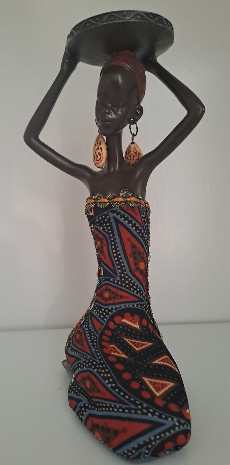 Vintage-style African tribal woman figurine designed as a decorative candle... Vintage-style African tribal woman figurine designed as a decorative candle...