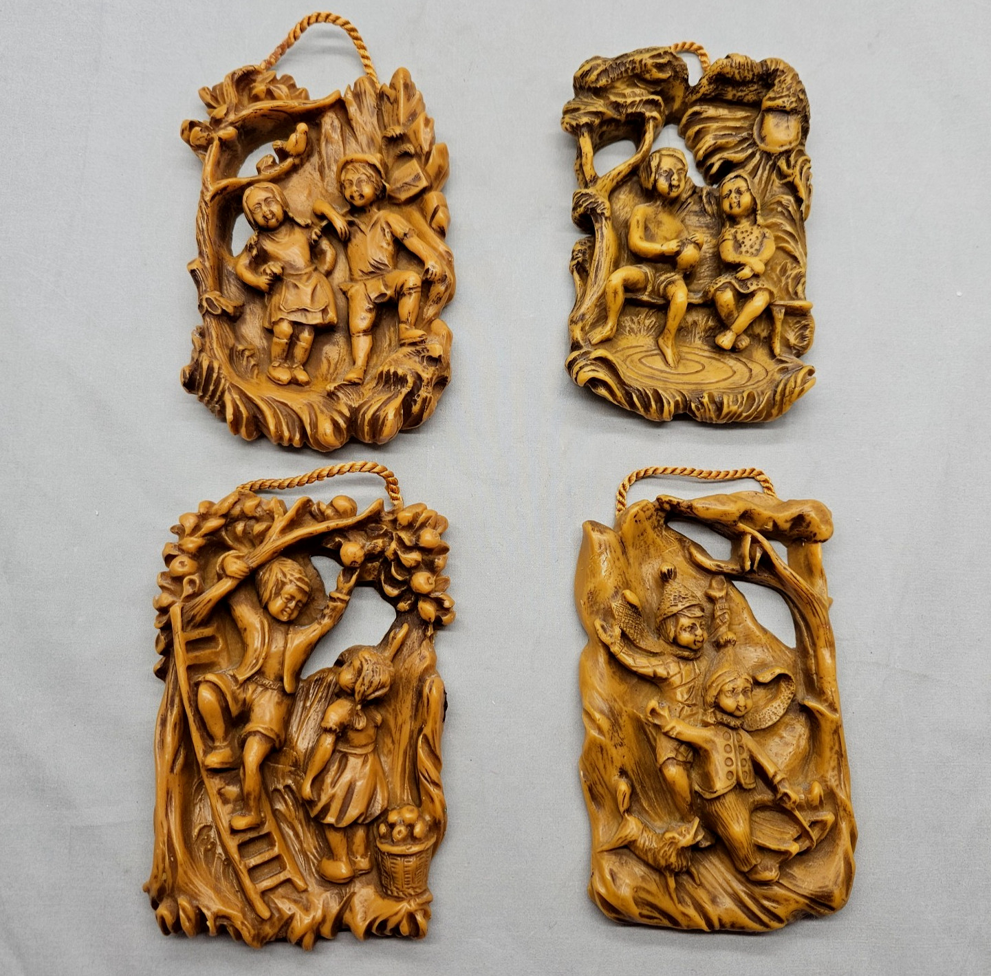 4 Vtg German Wax Relief Wall Decoration Boy & Girl Portraying Four Seasons Brown 4 Vtg German Wax Relief Wall Decoration Boy & Girl Portraying Four Seasons Brown